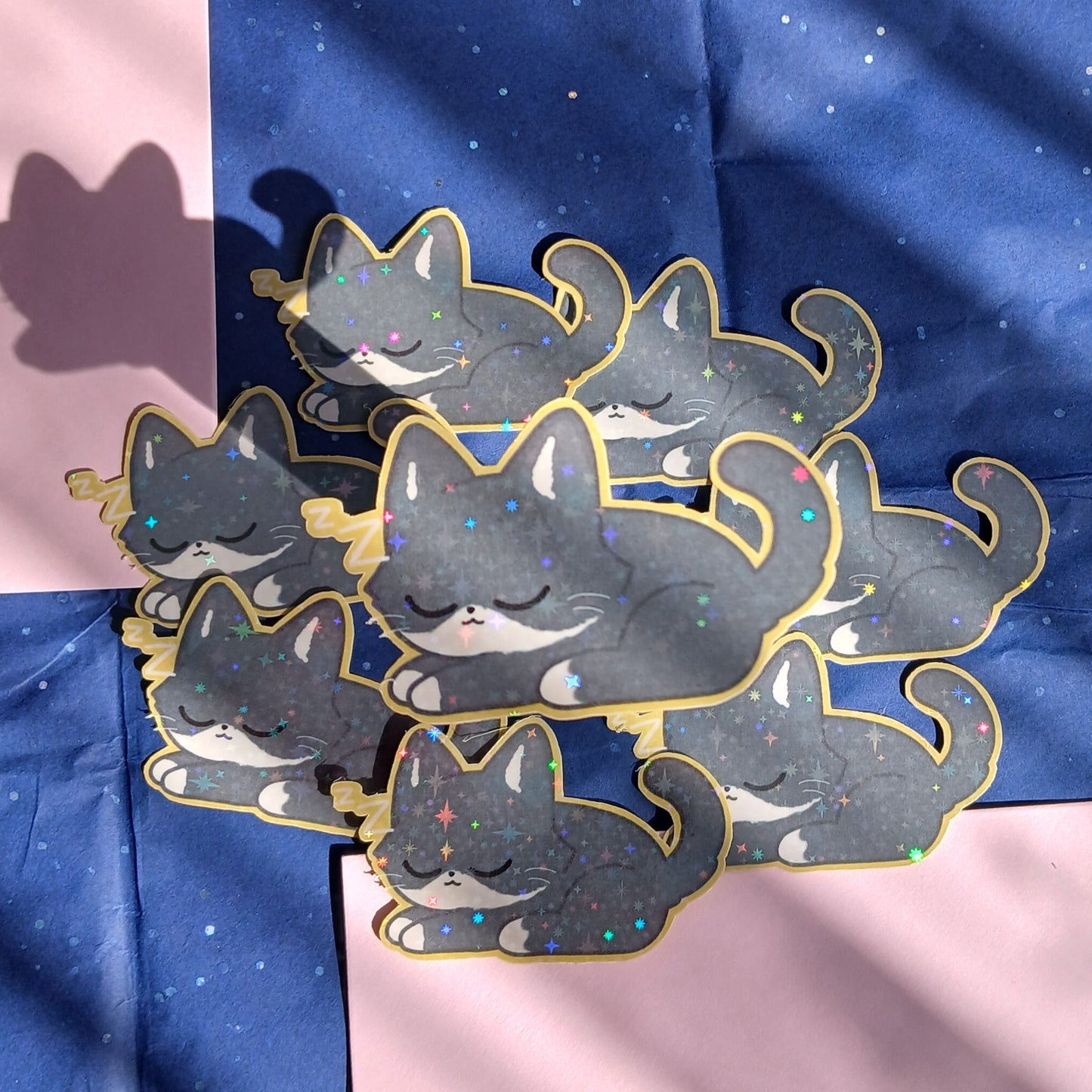 Sleeping grey tuxedo cat 2" single sticker